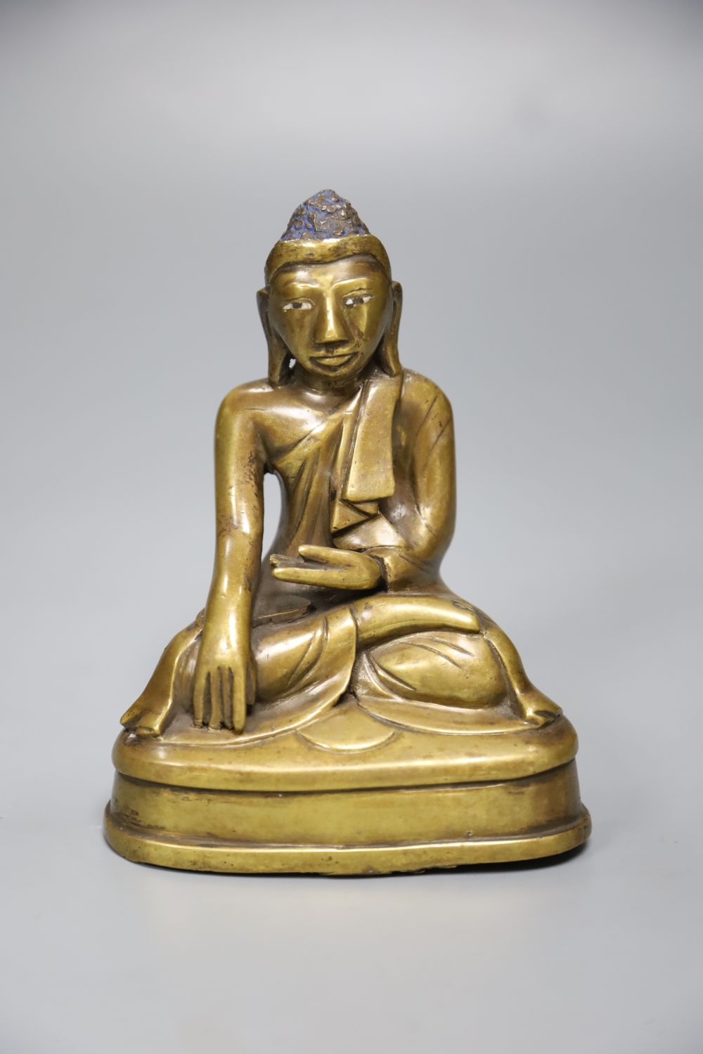 A late 19th century Burmese bronze figure of Buddha, height 15cm